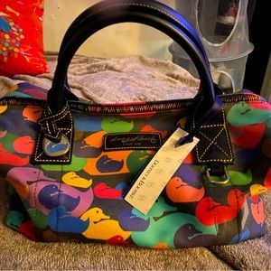 Dooney&Bourke bag. Brand new w/tags. Price on tag is 150$ b4 tax.Asking 100$ obo